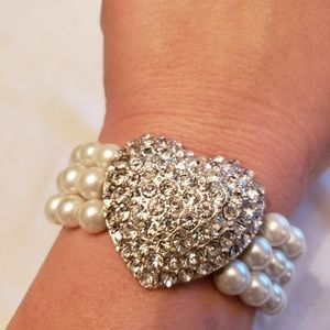 Rhinestone heart with three strand pearl bracelet